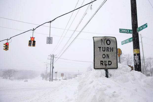 Snow is seen piled up on a snowbank in the Suffolk County town of Dix Hills, New York